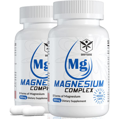 Two bottles of magnesium complex supplement with visible branding on a white background